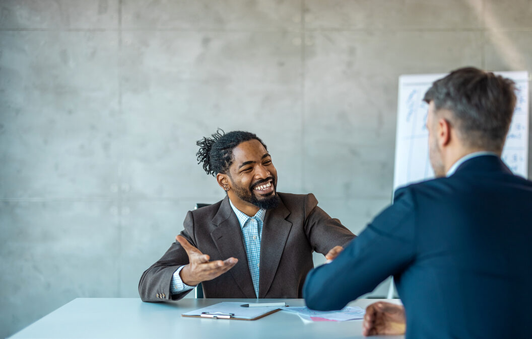 Two men in a talent acquisition meeting