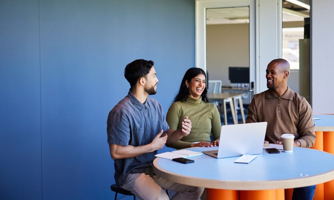 Diverse group of business people sharing ideas during a meeting