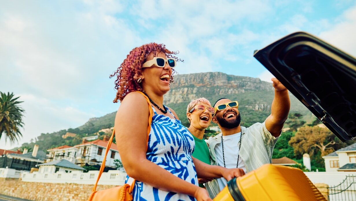 Joyful and positive friends taking a selfie on vacation