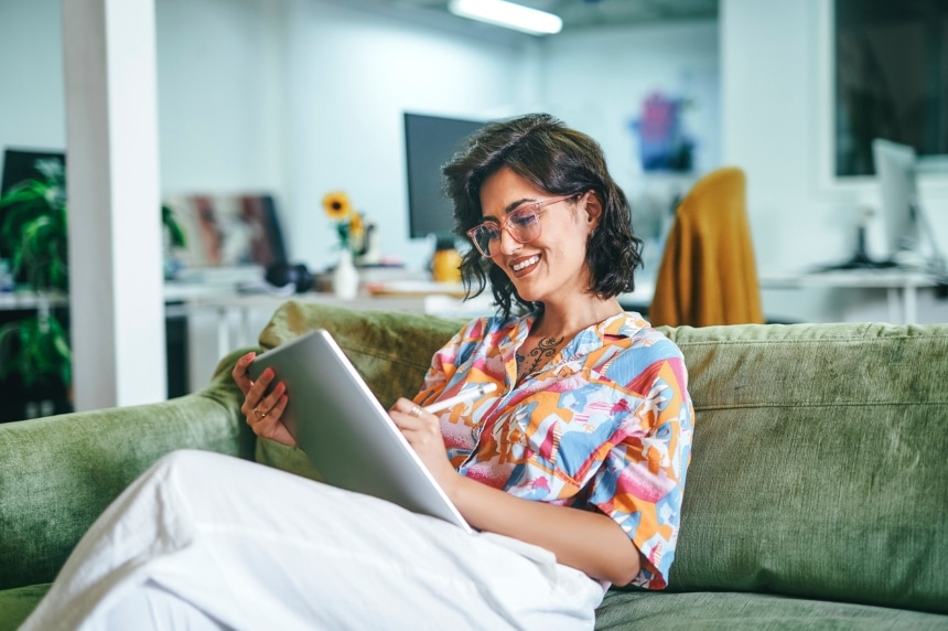 Businesswoman using digital tablet in office