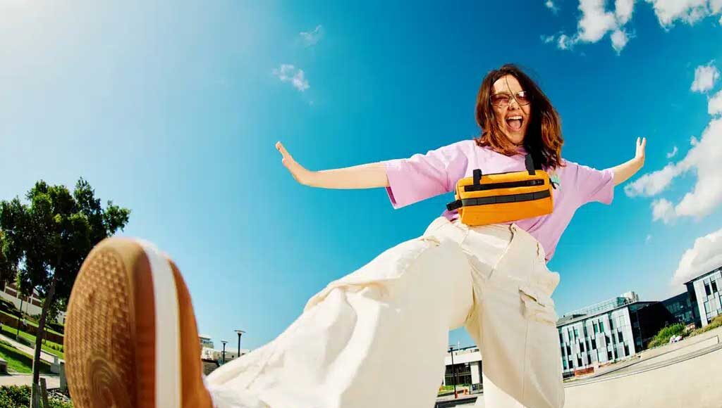 
		Gen Z teenager poses full body towards camera, showing attitude		