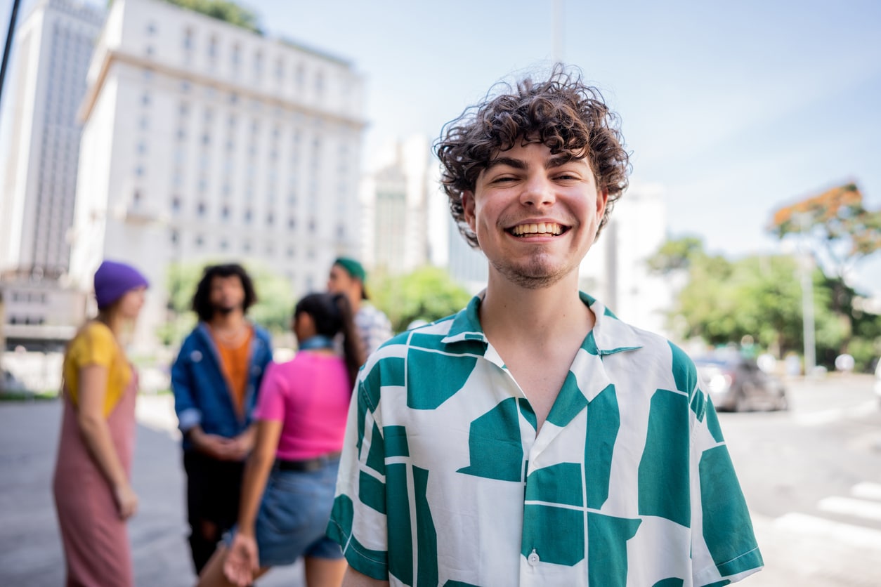 Young man and a group of friends discussing and understanding what sexuality is